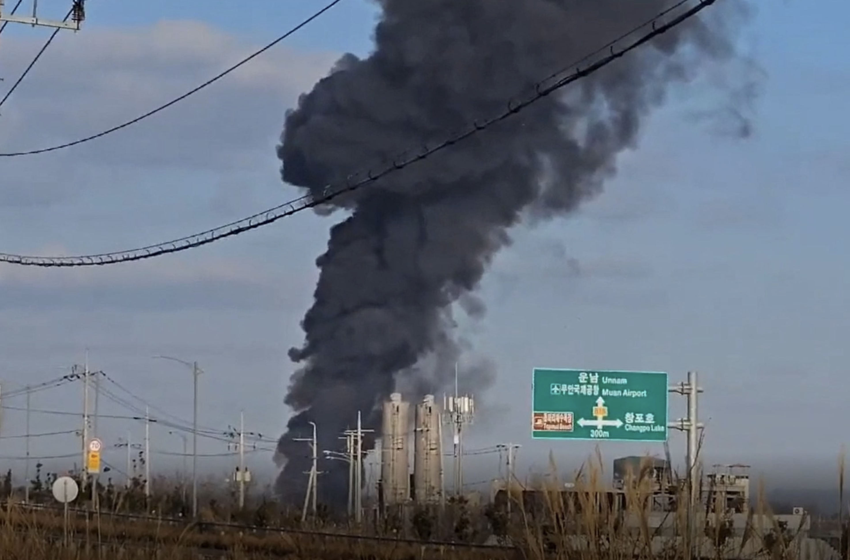 This screen grab from video footage captured near Muan International Airport shows black smoke billowing into the air from the airport in Muan, South Jeolla Province, South Korea, December 29, 2024. Photo: Reuters