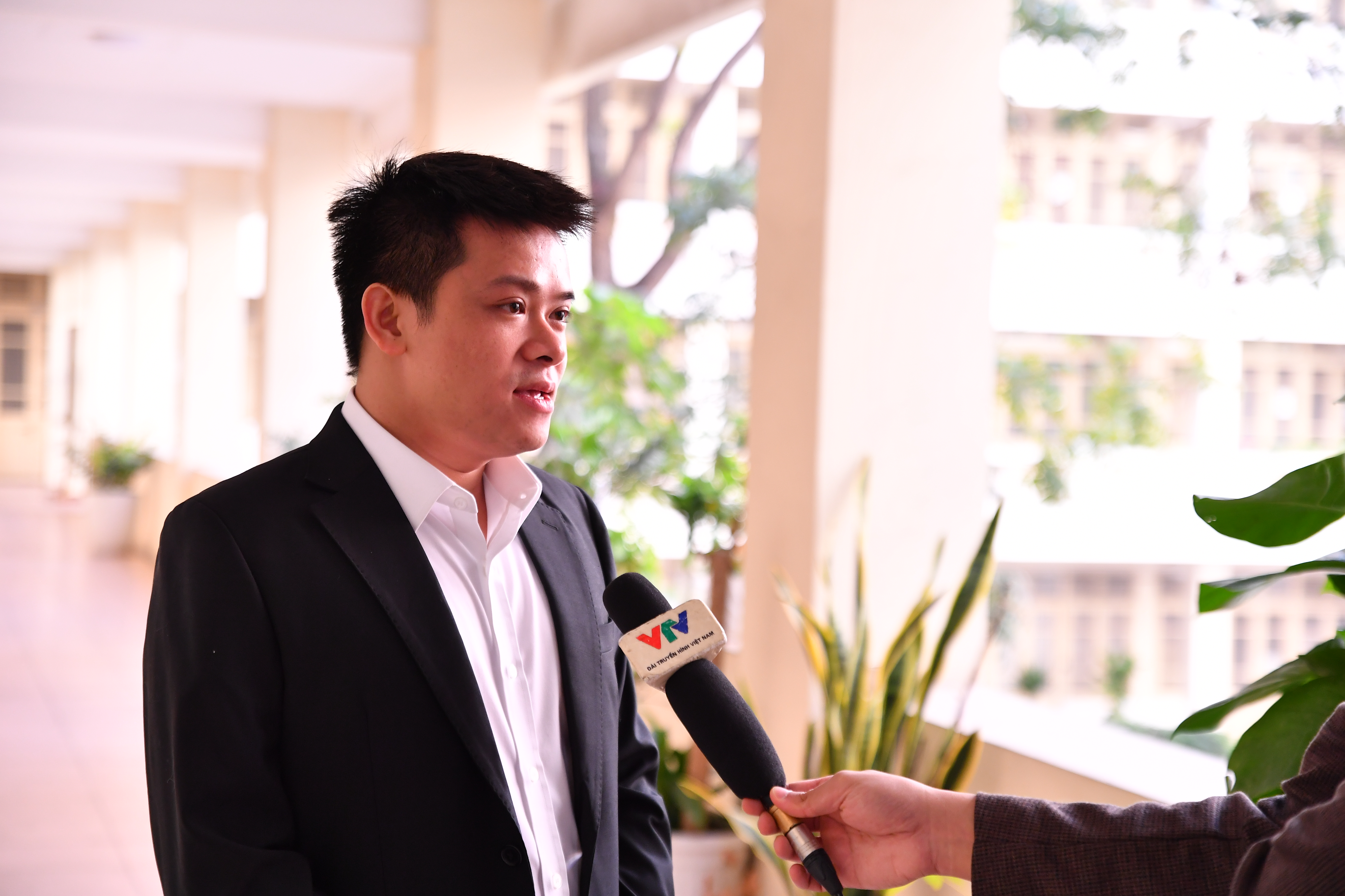 DOL English CEO and founder Le Dinh Luc is interviewed on the sidelines of the 2024 National Commendation Ceremony to celebrate Vietnamese students who excelled in international Olympiads and science competitions in Hanoi, December 29, 2024.