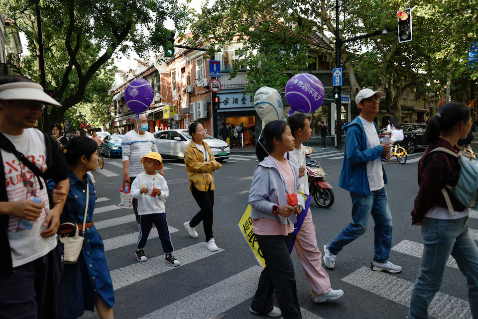 People walk on a street in Shanghai, China October 4, 2024. Photo: Reuters