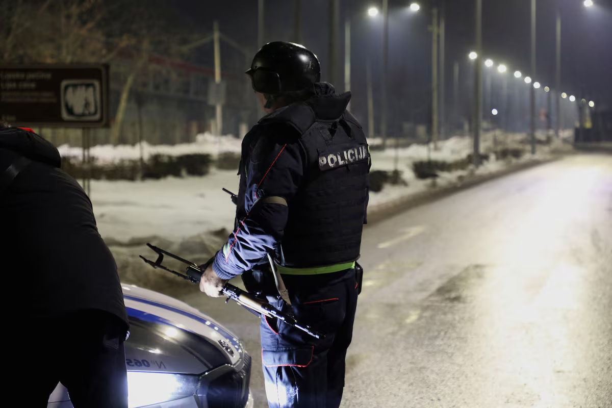 Police members stand on a checkpoint near where a gunman opened fire at a restaurant and killed several people in Cetinje, Montenegro, January 1, 2025. Photo: Reuters