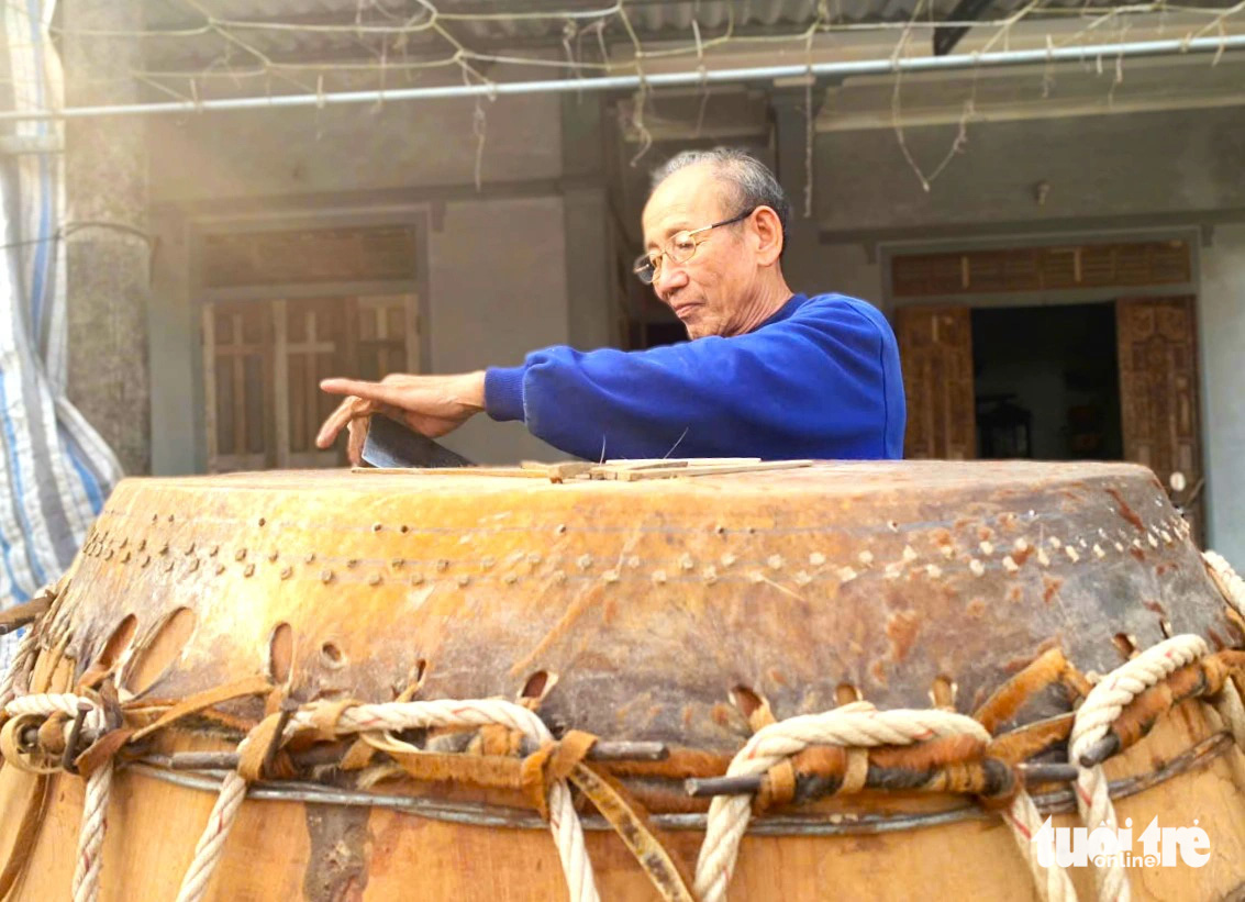 Bui Van Luong finishes a drum for delivery to a customer in Bac Thai Drum Village, Thach Hoi Commune, Ha Tinh City, Ha Tinh Province, north-central Vietnam. Photo: Le Minh