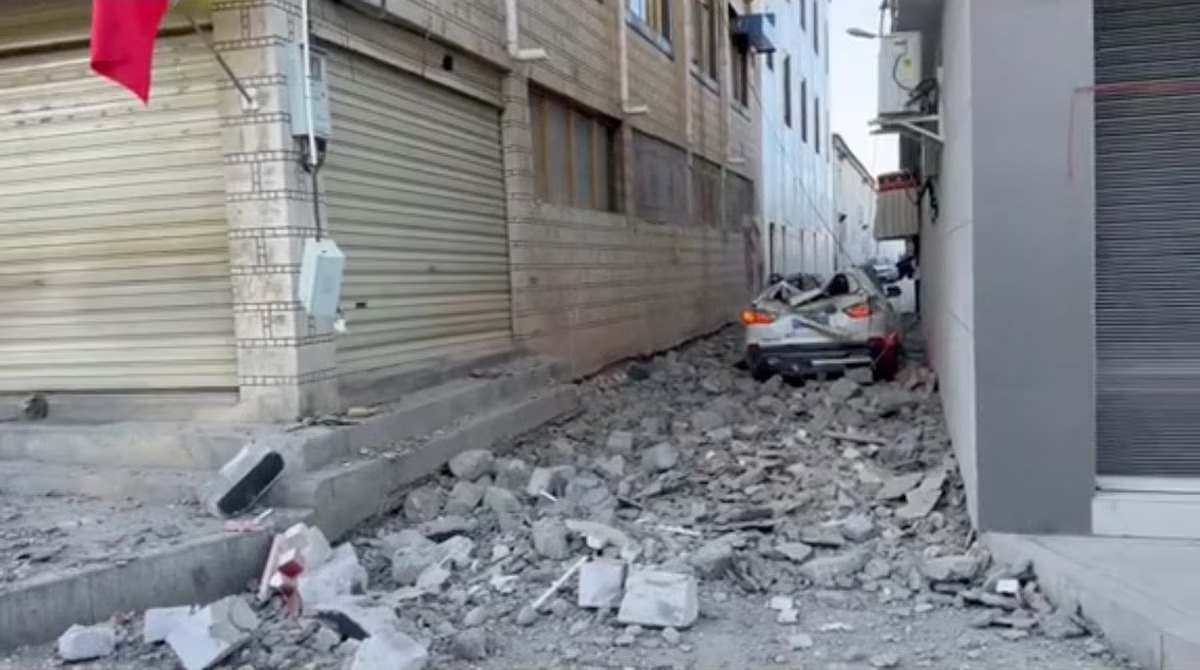 A damaged car lies amidst rubble on the street following an earthquake in Lhatse County, Shigatse City, Tibet Autonomous Region, China, January 7, 2025, in this screengrab obtained from a social media video. Photo: Reuters