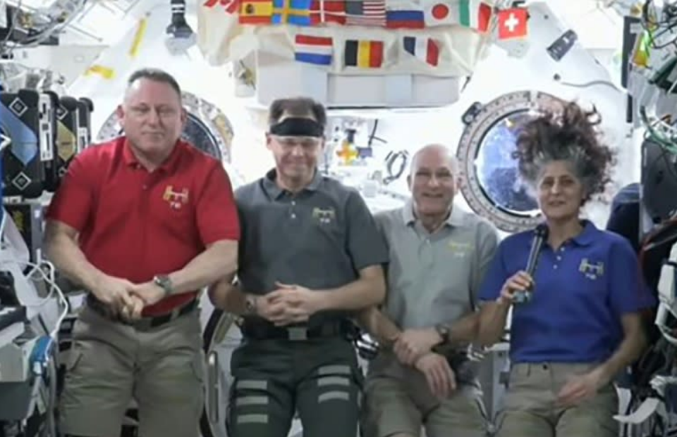 US astronauts upbeat seven months into eight-day mission