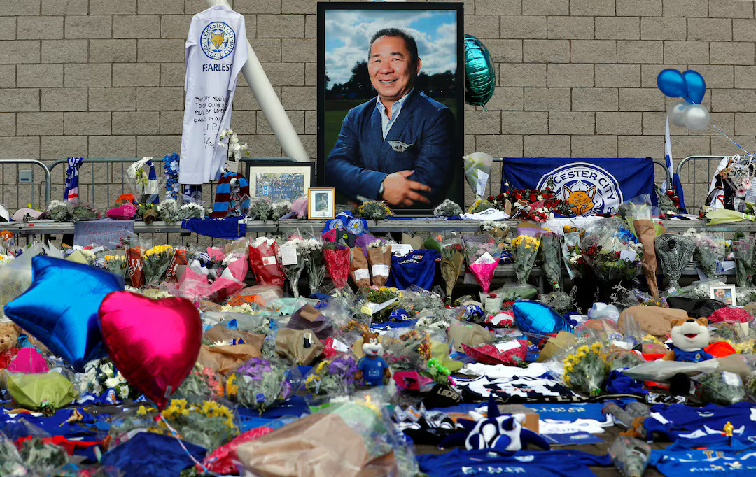 Tributes left for Leicester City's owner Thai businessman Vichai Srivaddhanaprabha, and four other people who died when the helicopter they were traveling in crashed as it left the ground after the match on Saturday, are seen at the King Power Stadium on the day a book of condolence opened, in Leicester, Britain October 30, 2018. Photo: Reuters