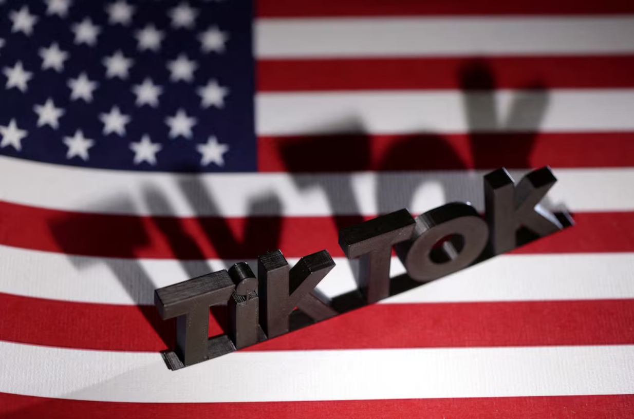 TikTok logo is placed on a U.S. flag in this illustration taken, April 25, 2024. Photo: Reuters