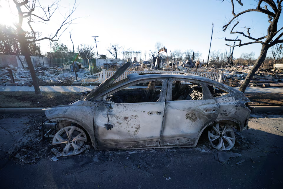 Remains of a Tesla electric car, destroyed by the Palisades Fire are seen, at the Pacific Palisades neighborhood in Los Angeles, California, U.S. January 13, 2025. Photo: Reuters