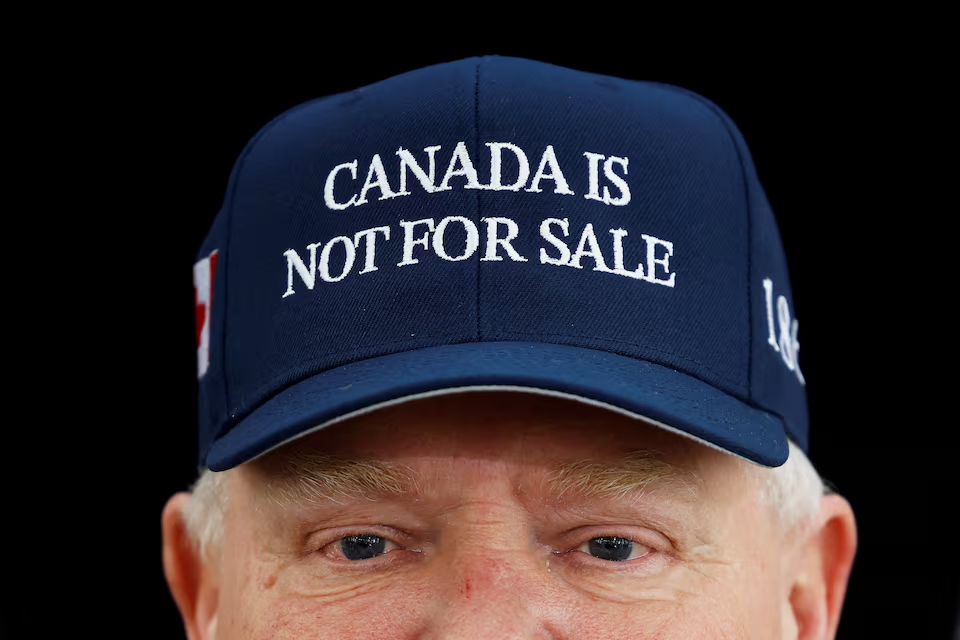 Ontario Premier Doug Ford, wearing a 'Canada is not for sale' hat, speaks to journalists before a provincial and territorial leaders meeting in Ottawa, Ontario, Canada January 15, 2025. Photo: Reuters