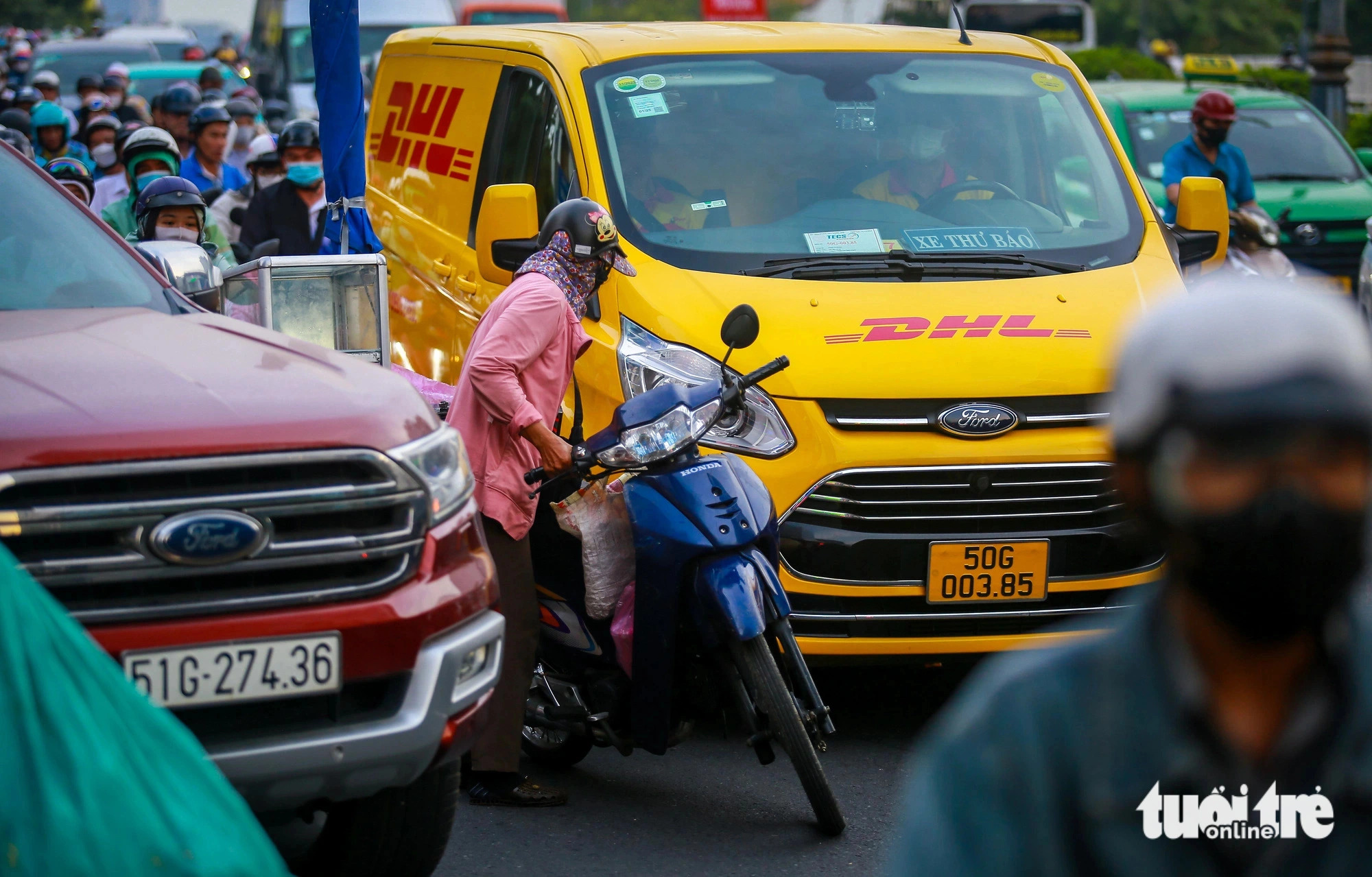 Motorcycles crowd onto Nguyen Van Troi Street. Photo: Le Phan / Tuoi Tre