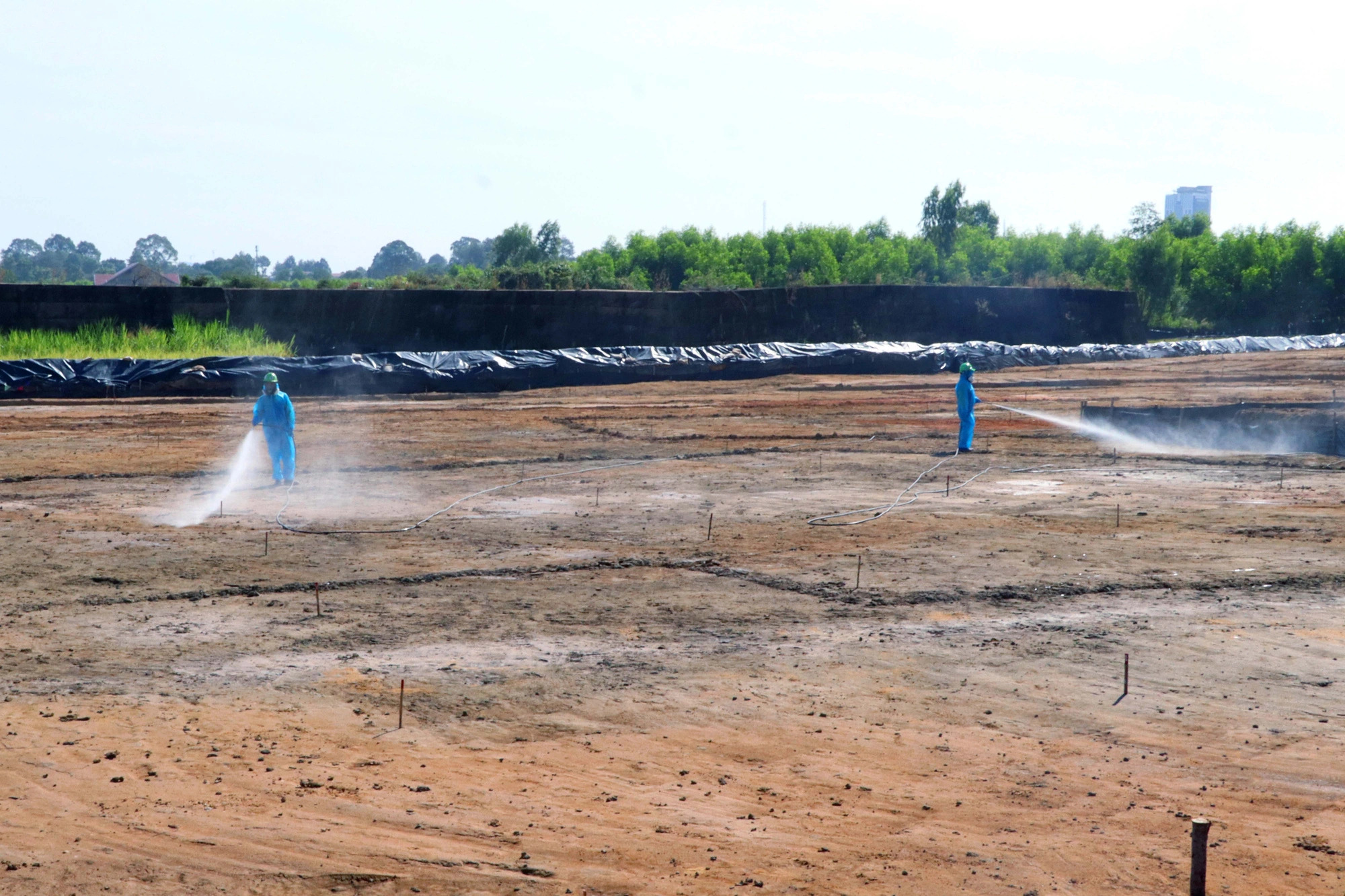 Staff are seen working on the dioxin remediation project at Bien Hoa Airbase, Dong Nai Province, southern Vietnam. Photo: A Loc / Tuoi Tre