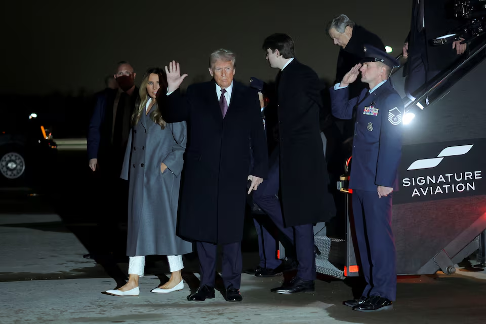 Donald Trump, Melania and son Barron arrive at Dulles International Airport, Virginia, January 18, 2025. Photo: Reuters