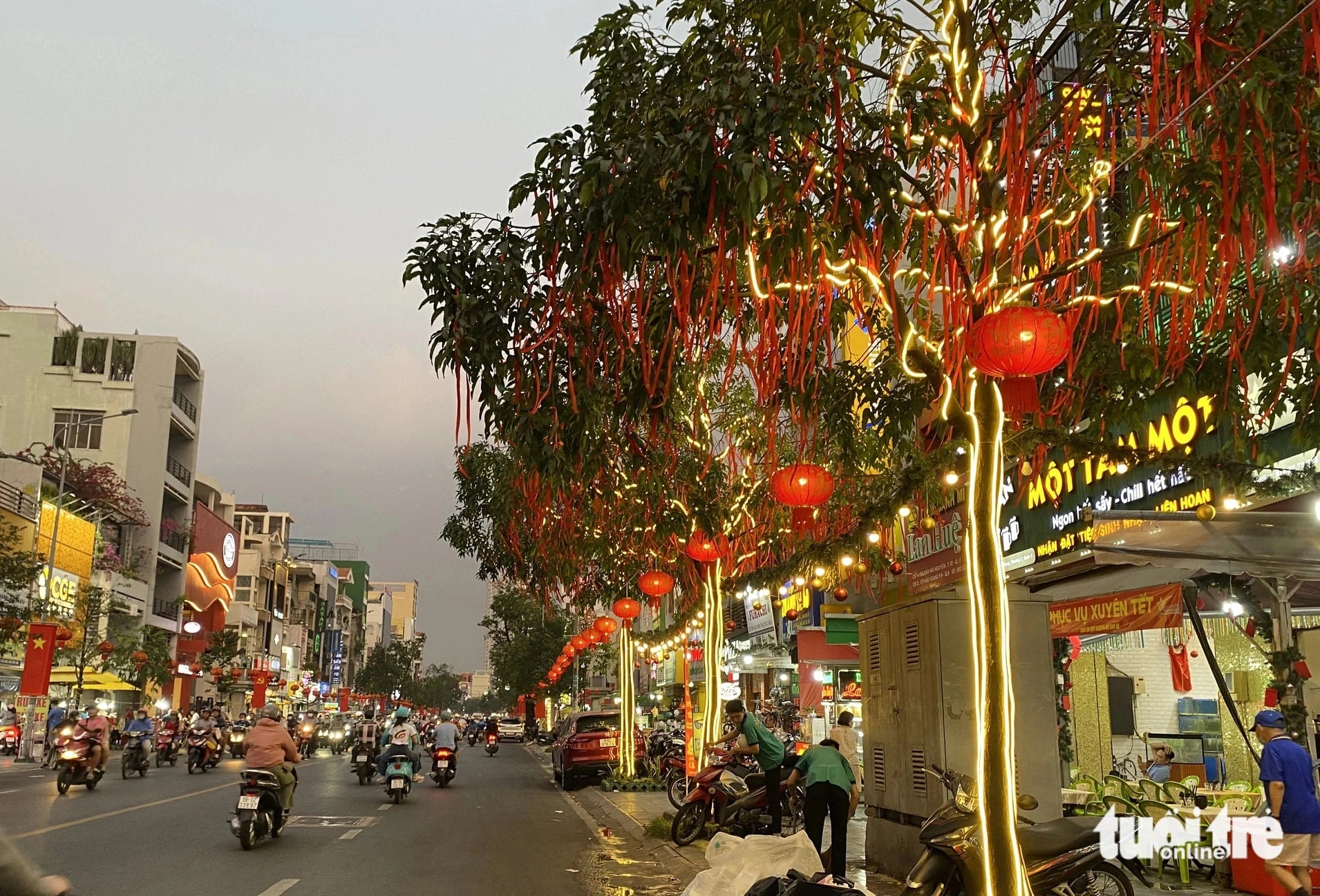 Hau Giang Street, District 6, glows at night. Photo: The Huy/ Tuoi Tre