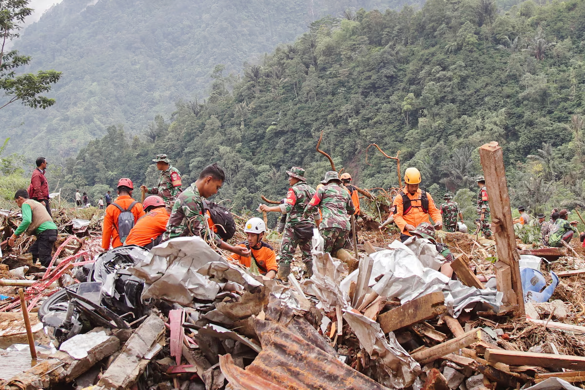 Indonesian rescuers halt evacuation due to bad weather after landslide kills 25, official says