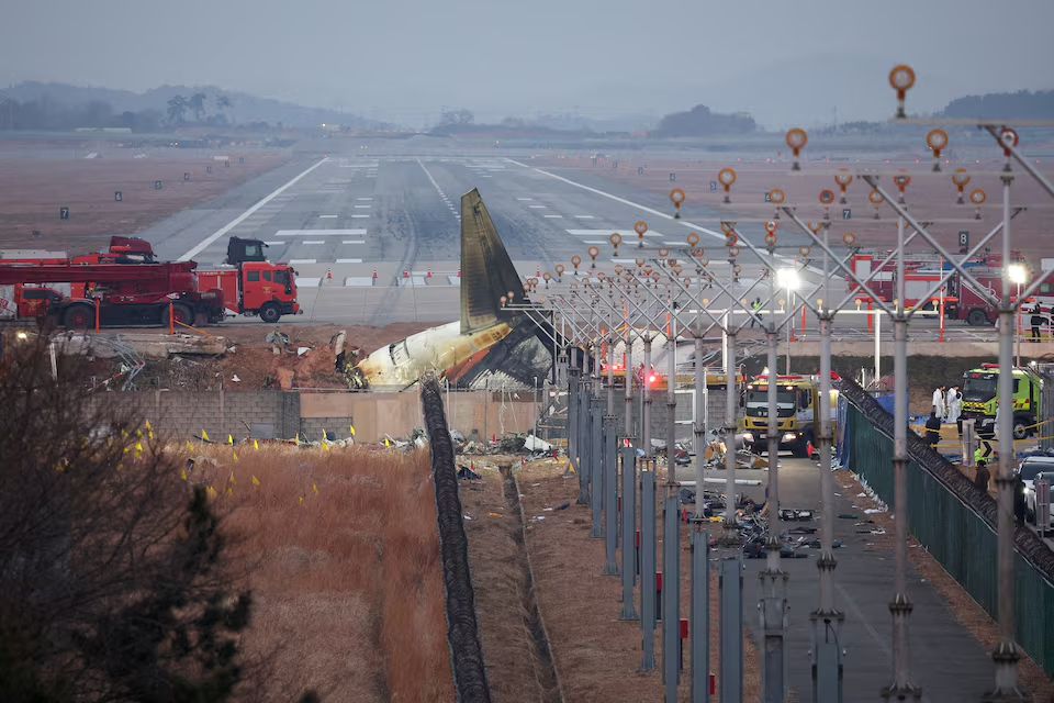 The wreckage of the Jeju Air aircraft that went off the runway and crashed lies at Muan International Airport, in Muan, South Korea, December 30, 2024. Photo: Reuters