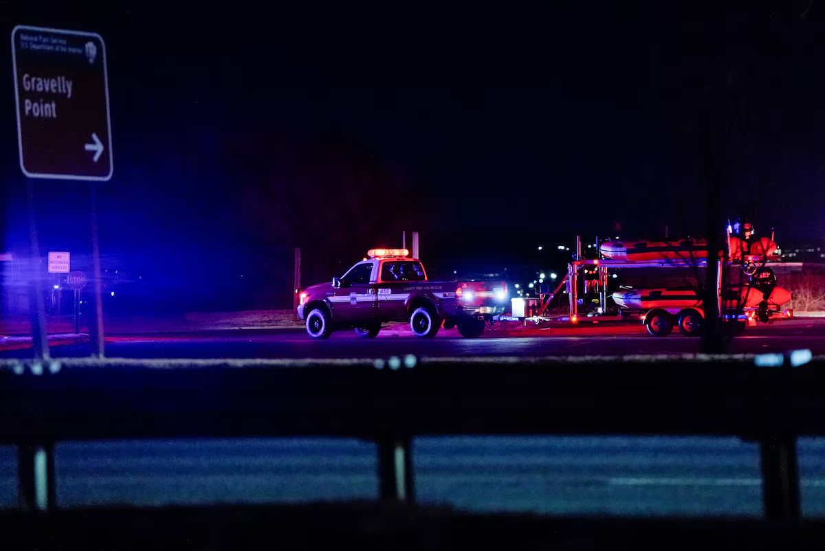 Emergency vehicles leave Gravelly Point, after American Eagle flight 5342 collided with a helicopter while approaching Reagan Washington National Airport and crashed in the Potomac River, in Arlington, Virginia, U.S. January 29, 2025. Photo: Reuters