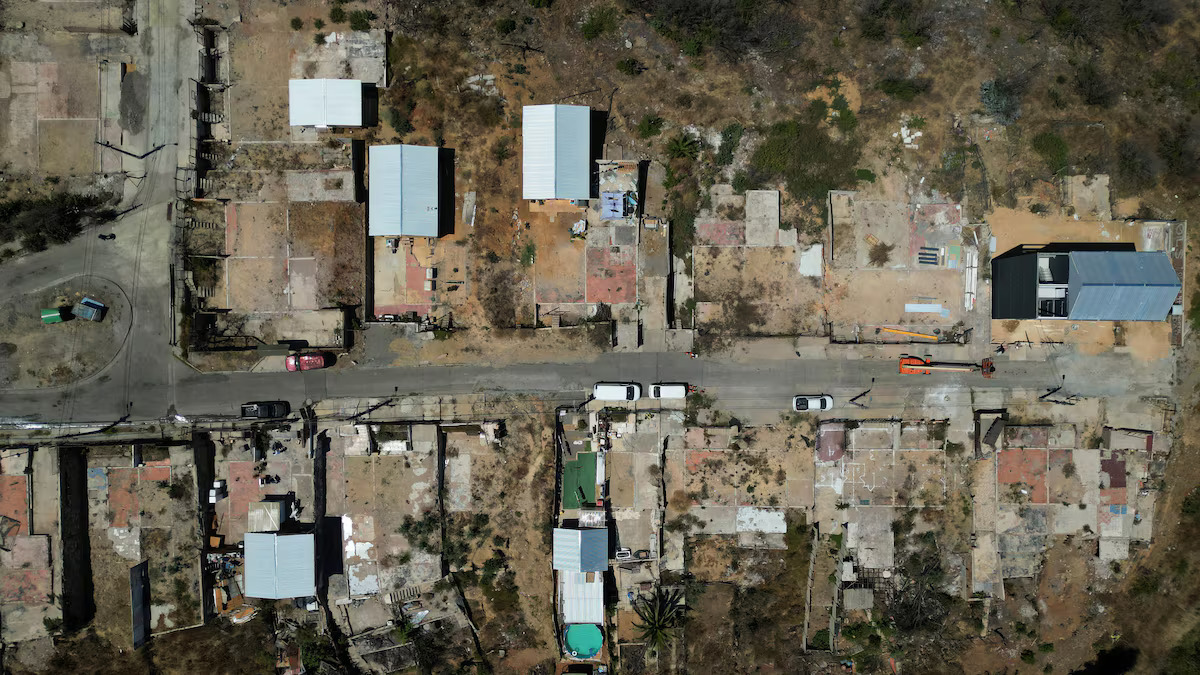 [6/6]A drone view shows an area where houses were destroyed by wildfires, next to some houses that have been rebuilt in Vina del Mar, Chile February 1, 2025. Photo: Reuters