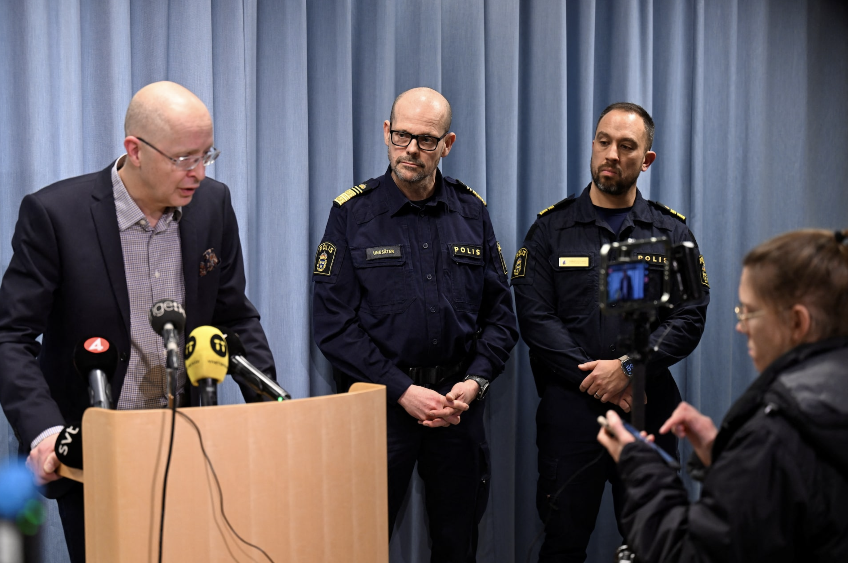 Orebro Healthcare Director Jonas Claesson, Regional Chief of Police Patrick Ungsater, and head of the local police district Roberto Eid Forest, attend a press conference after five people were shot at the adult education center Campus Risbergska school in Orebro, Sweden, February 4, 2025. Photo: Reuters