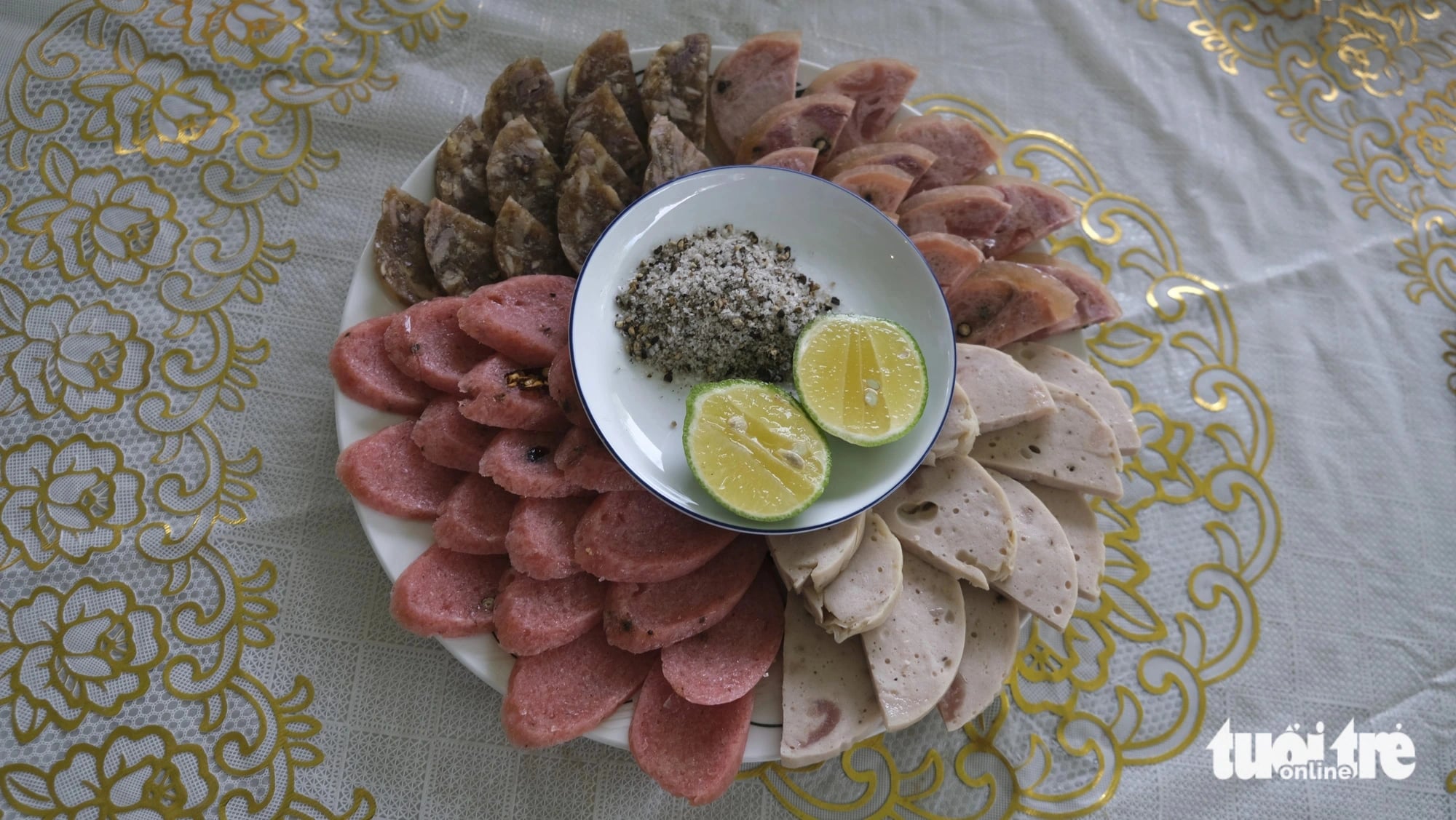 A plate of nem chua (the red ones) and other types of Vietnamese pork rolls. Photo: Dang Tuyet / Tuoi Tre