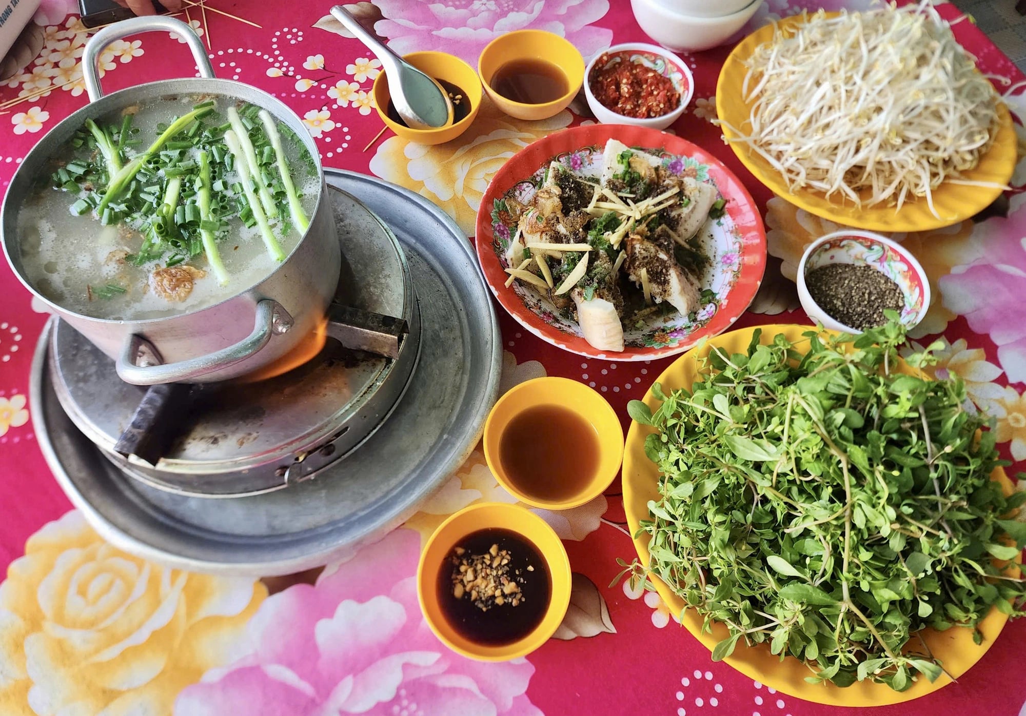 Bitter herbs with snakehead fish congee makes a distinctive delicacy in Vietnam's Mekong Delta