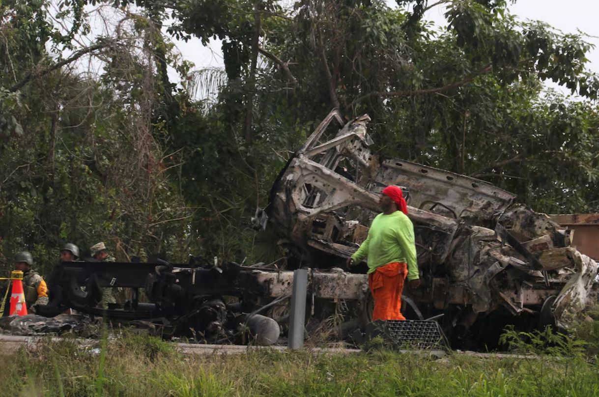 A burned bus is pictured after colliding with a trailer, Escarcega, Campeche, Mexico, February 8, 2025. Photo: Reuters