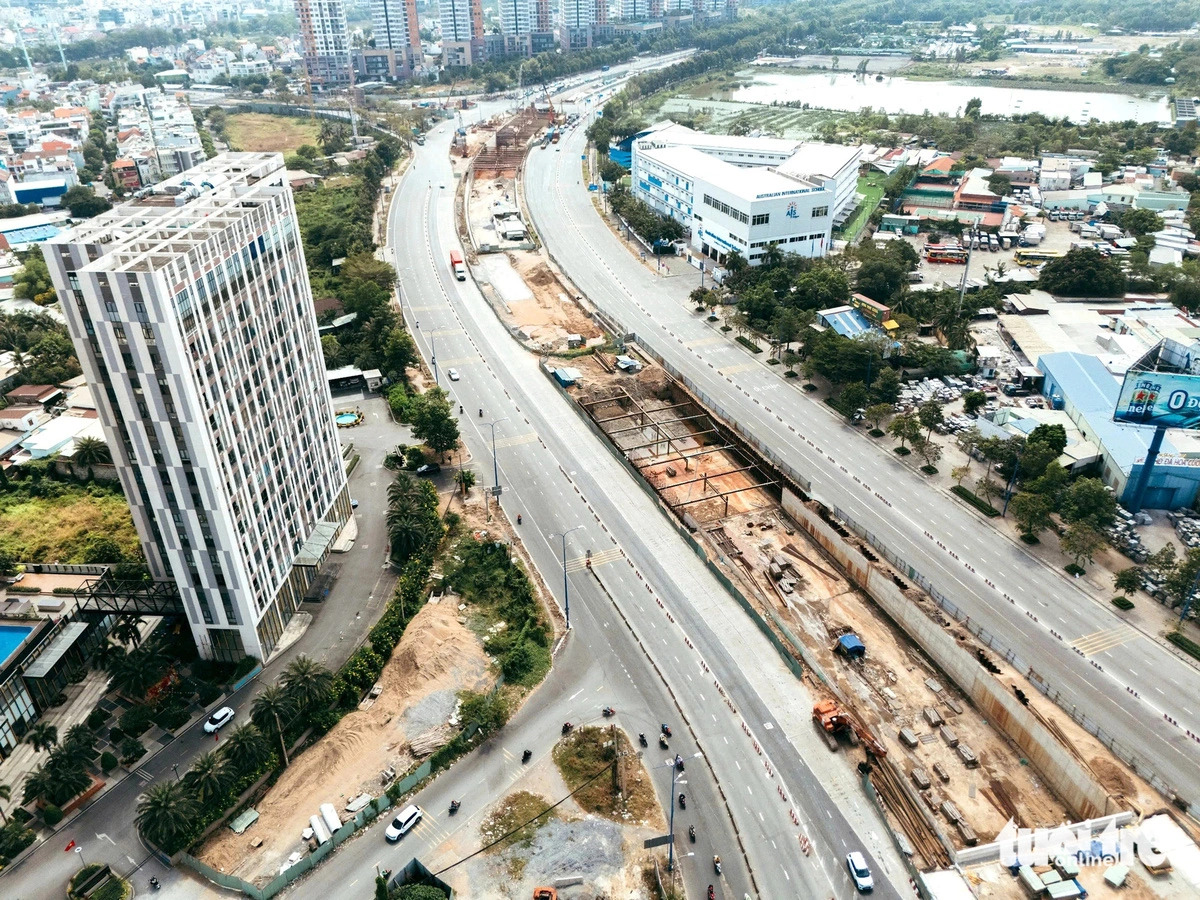 This photo illustration shows the construction site of a multi-level underpass at An Phu intersection in Ho Chi Minh City – a large infrastructure investment project. Photo: Thanh Hiep / Tuoi Tre