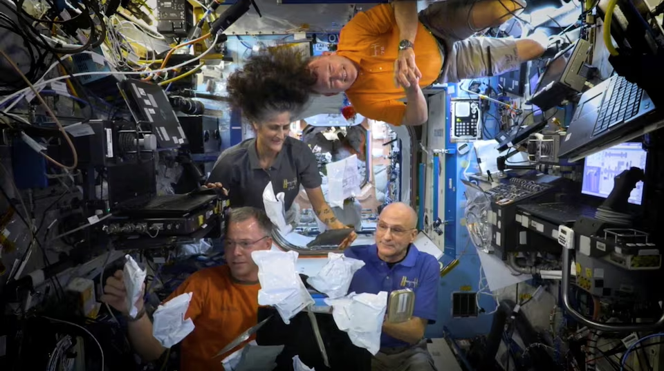 NASA astronauts Sunita Williams, Nick Hague, Barry Wilmore, and Donald Pettit unbox Thanksgiving meals, from the International Space Station (ISS), in this screen grab taken from a handout video, released on November 26, 2024. Photo: Reuters