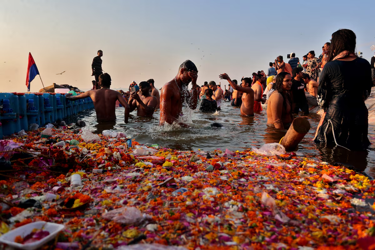 Devotees take a dip at Sangam, the confluence of the Ganges and Yamuna rivers with the mythical invisible Saraswati river, to mark Maghi Purnima, one of the auspicious days during the 'Maha Kumbh Mela', or the Great Pitcher Festival, in Prayagraj, India, February 12, 2025. Photo: Reuters