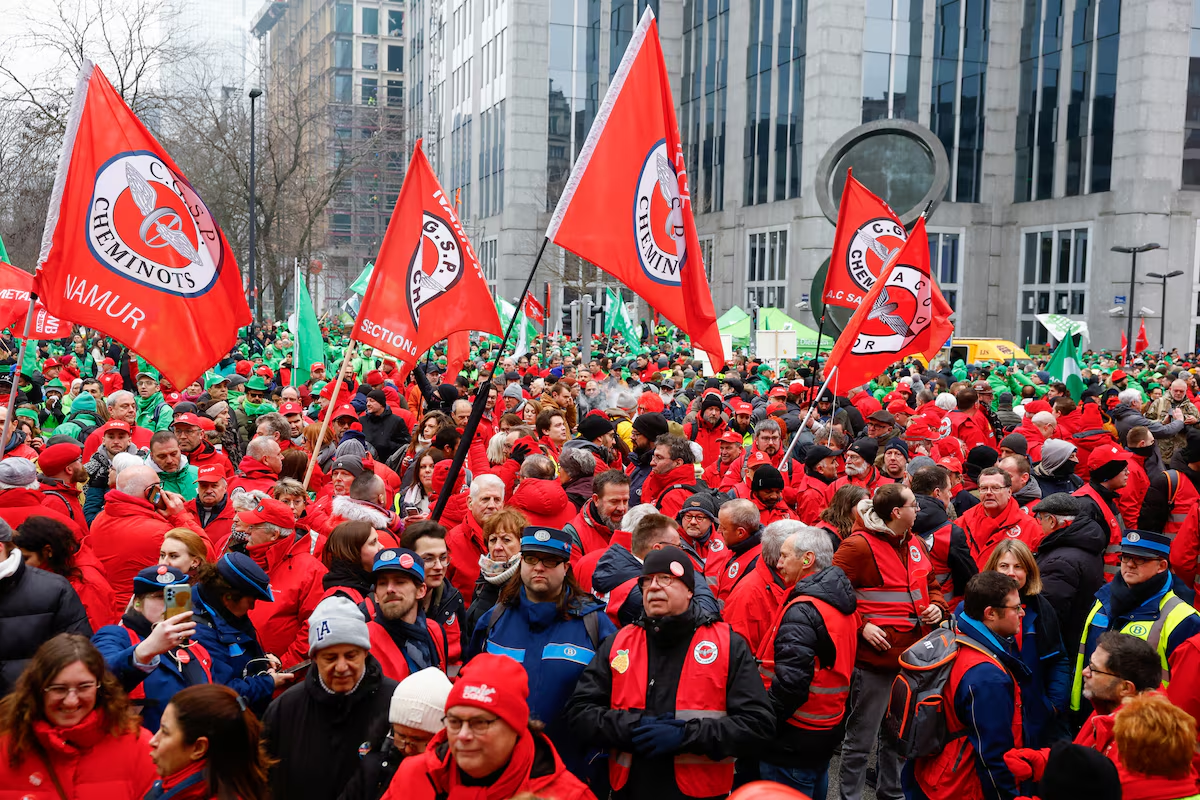 Tens of thousands in Belgium protest over pension reforms, halting air traffic