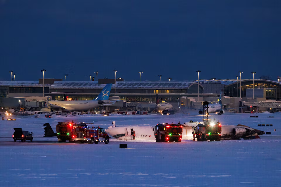 Delta plane flips upside down on landing at Toronto airport, injuring 18