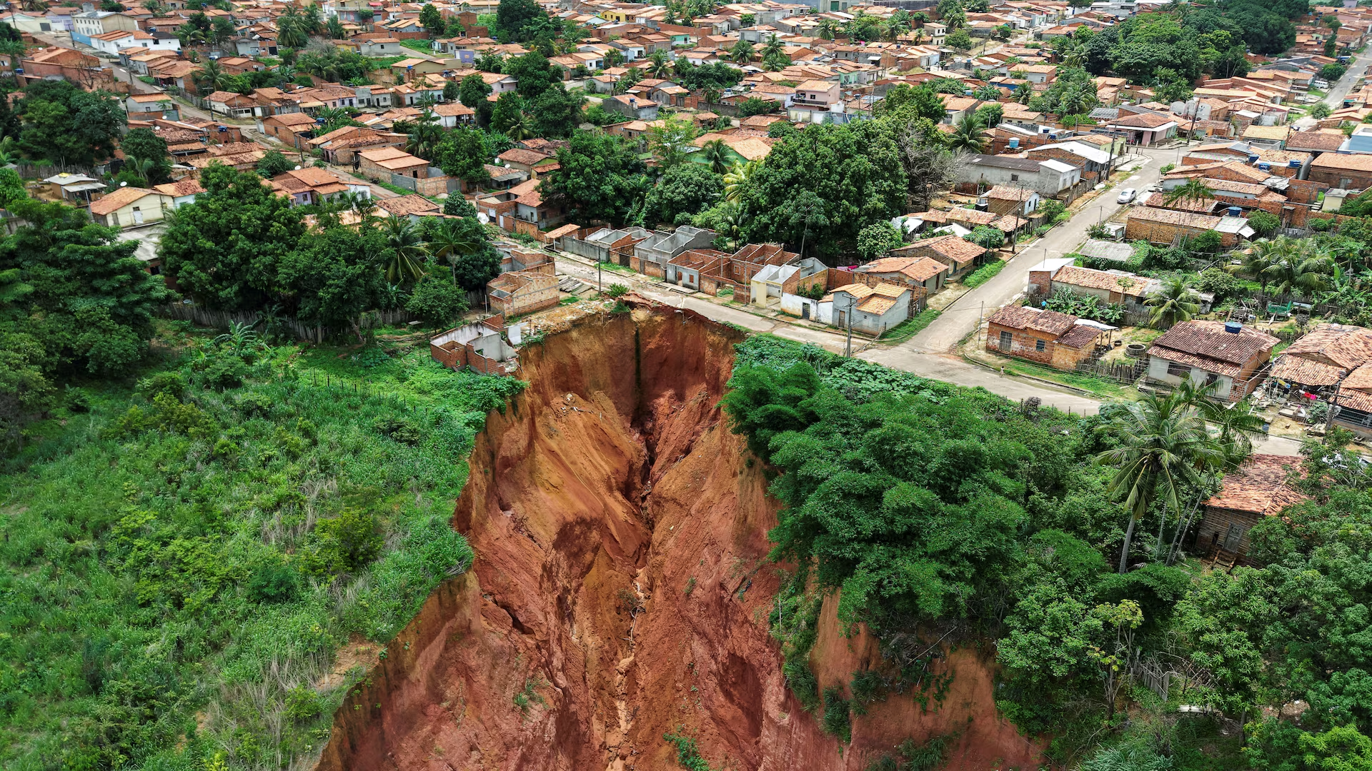 A drone view shows the town of Buriticupu, a small Amazonian town that was declared in a state of public calamity due to sinkholes that threaten the community, in Buriticupu, state of Maranhao, Brazil February 20, 2025. Photo: Reuters