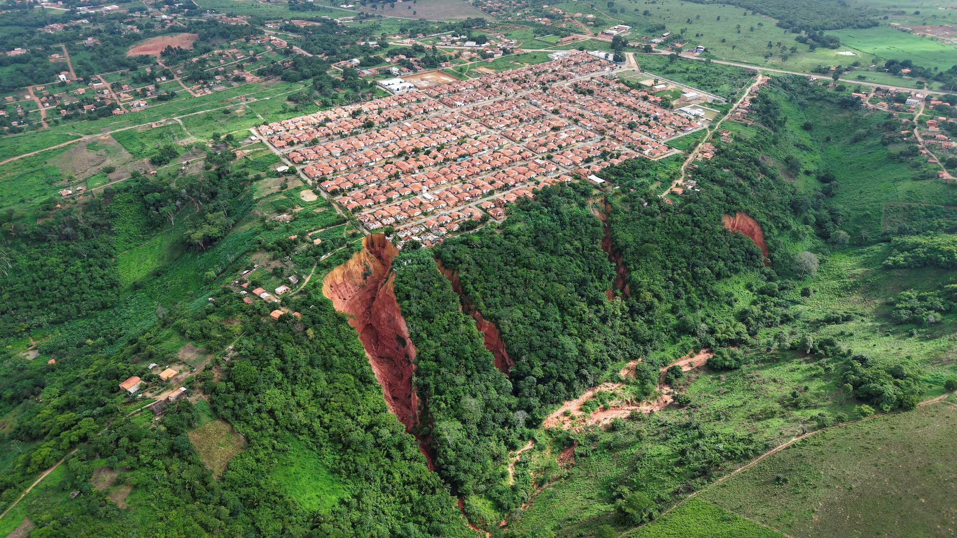 A drone view shows the town of Buriticupu, a small Amazonian town that was declared in a state of public calamity due to sinkholes that threaten the community, in Buriticupu, state of Maranhao, Brazil February 20, 2025. Photo: Reuters