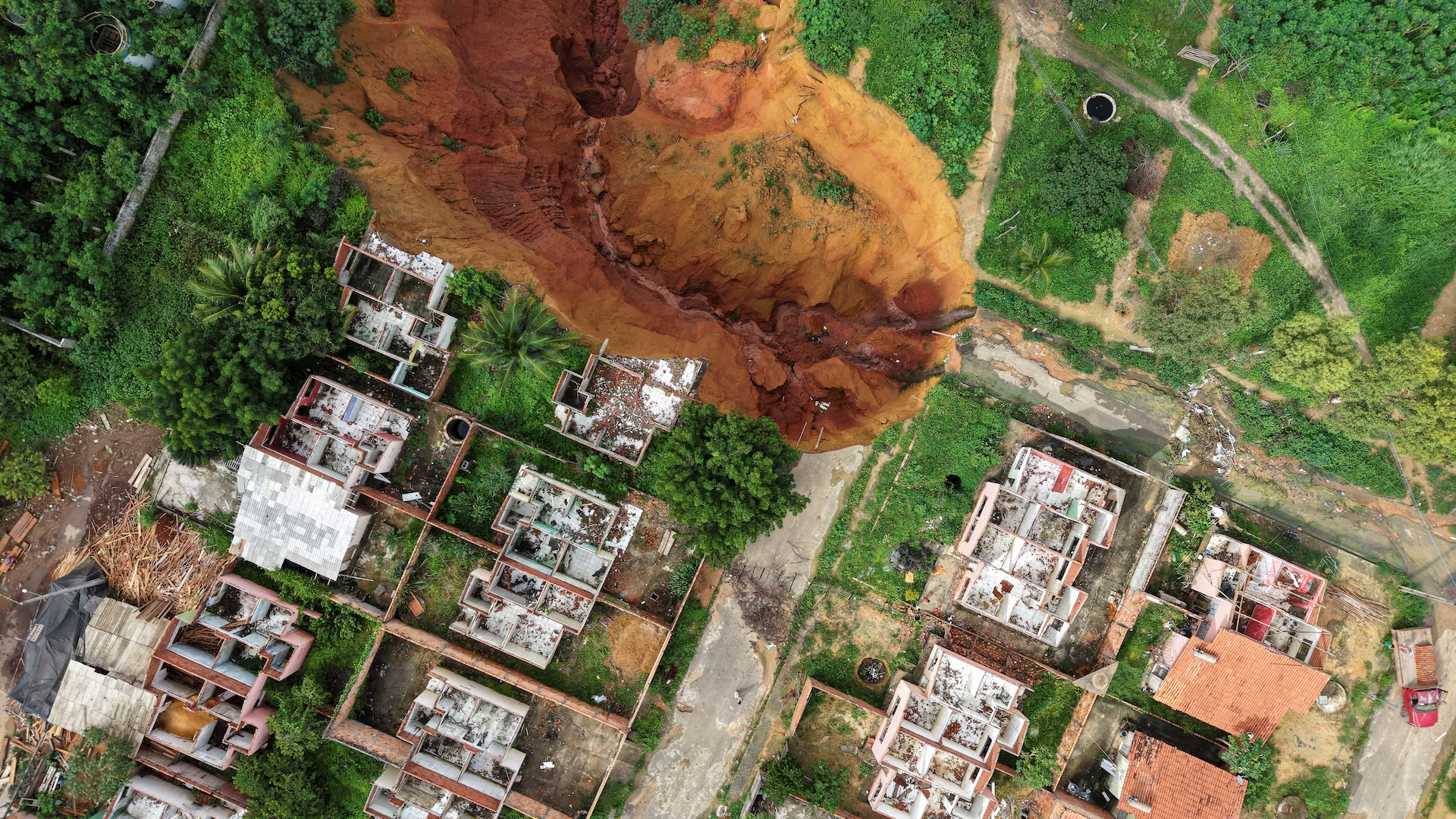 A drone view shows the town of Buriticupu, a small Amazonian town that was declared in a state of public calamity due to sinkholes that threaten the community, in Buriticupu, state of Maranhao, Brazil February 20, 2025. Photo: Reuters