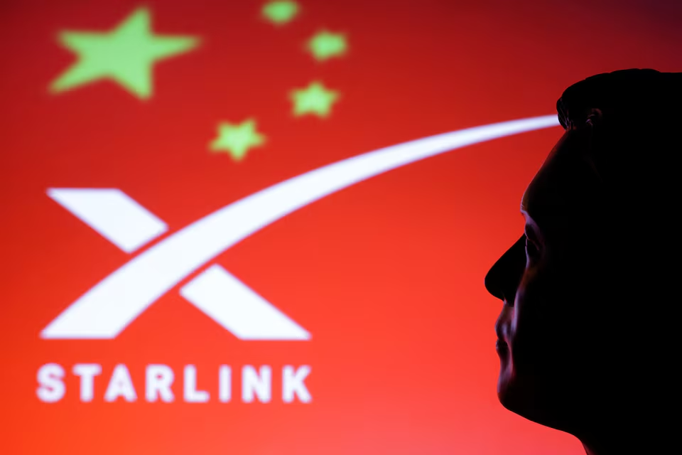 A 3D-printed miniature model of Elon Musk, a Chinese flag and the Starlink logo are seen in this illustration taken, February 20, 2025. Photo: Reuters