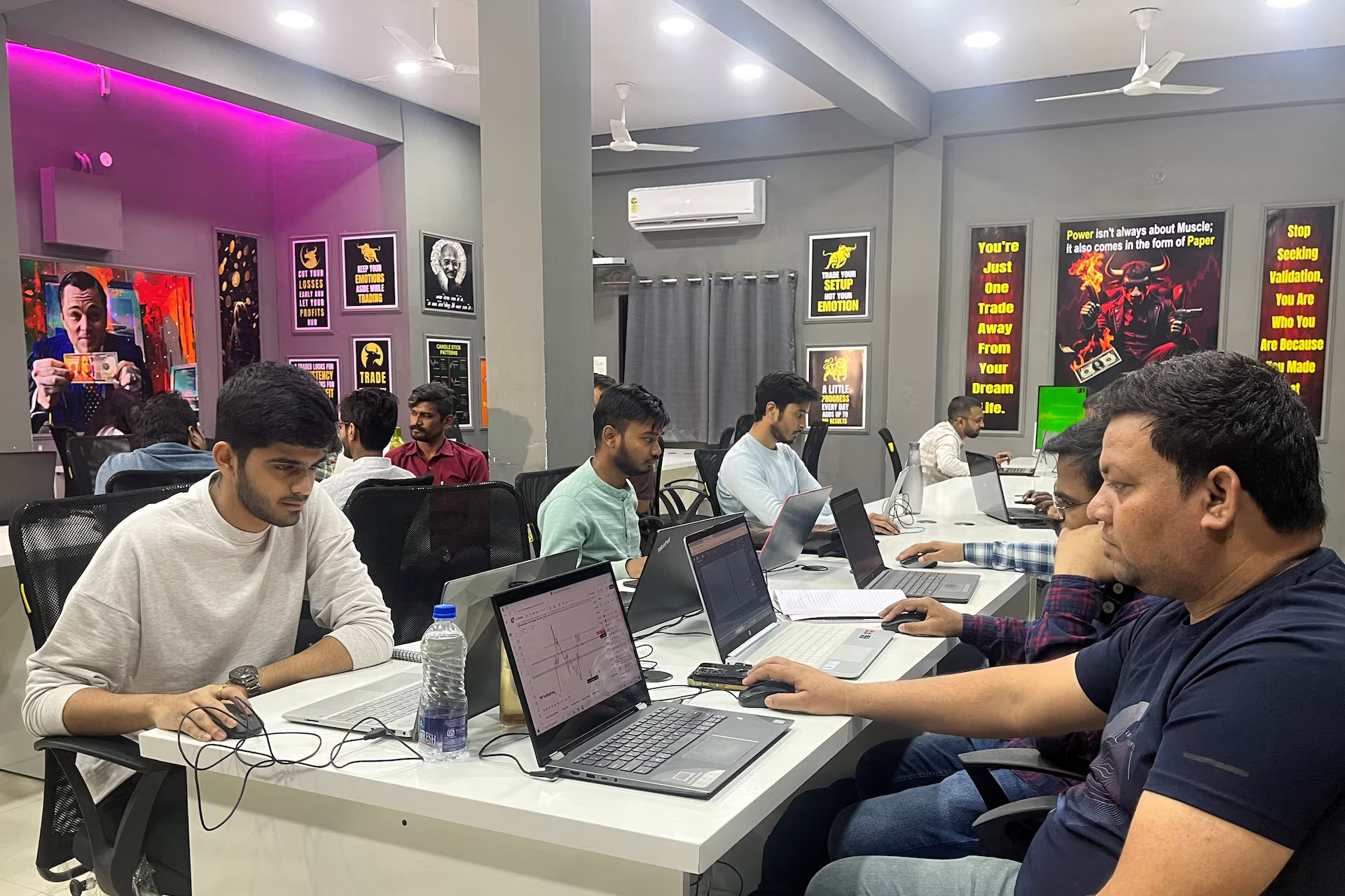 Students attend an evening class for equity and crypto trading at the Thoughts Magic Trading academy in Nagpur, India, February 13, 2025. Photo: Reuters