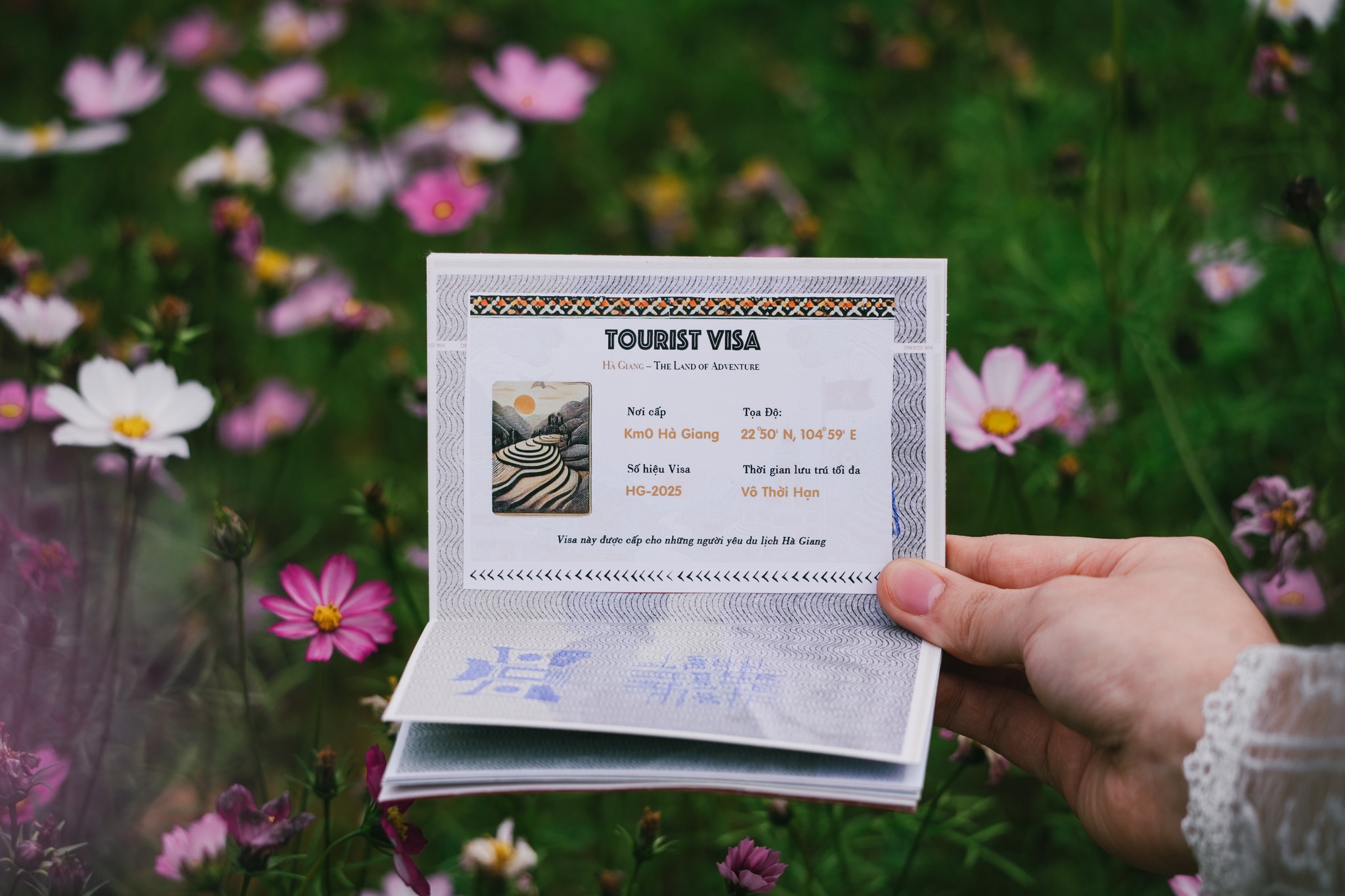 A tourist shows the ‘Ha Giang Passport.’ Photo: Supplied