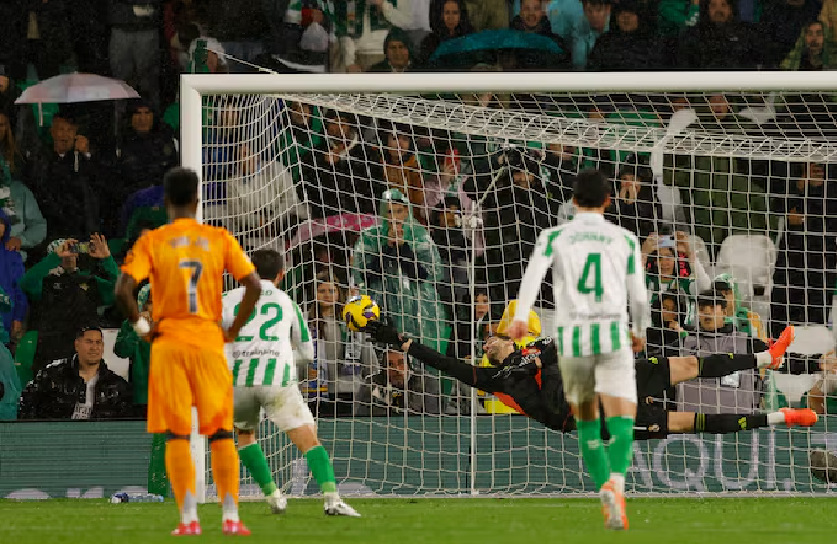 Real Madrid miss chance to go top with 2-1 loss at Betis