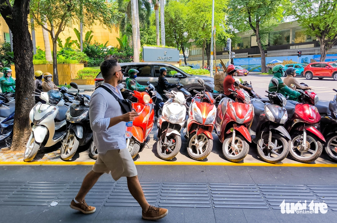 Motorbikes are parked neatly on Hai Ba Trung Street in District 1, Ho Chi Minh City. Photo: Le Phan / Tuoi Tre