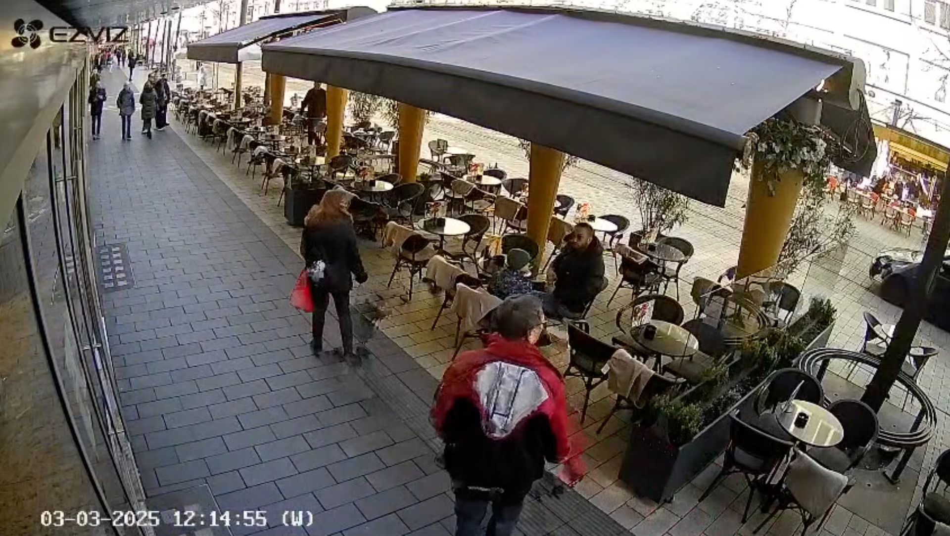 A still frame obtained from CCTV footage shows the car that drove into a crowd of people, speeding past a coffee tent, in Mannheim, Germany, March 3, 2025, in this screengrab obtained social media video. Eiscafe Del Sole Mannheim via Reuters