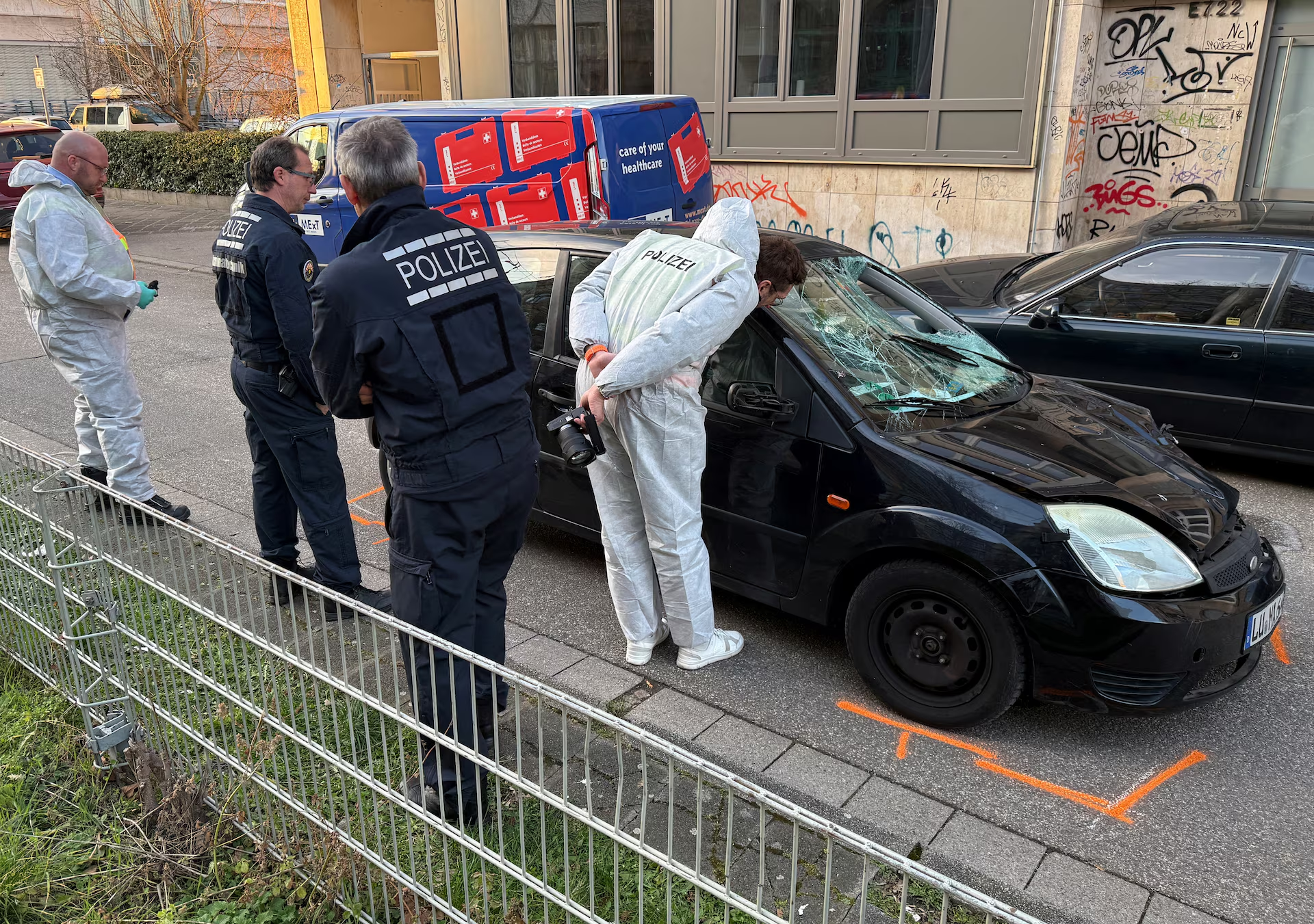 Forensic experts work on a car which drove into a crowd, in Mannheim, Germany, March 3, 2025. Photo: Reuters