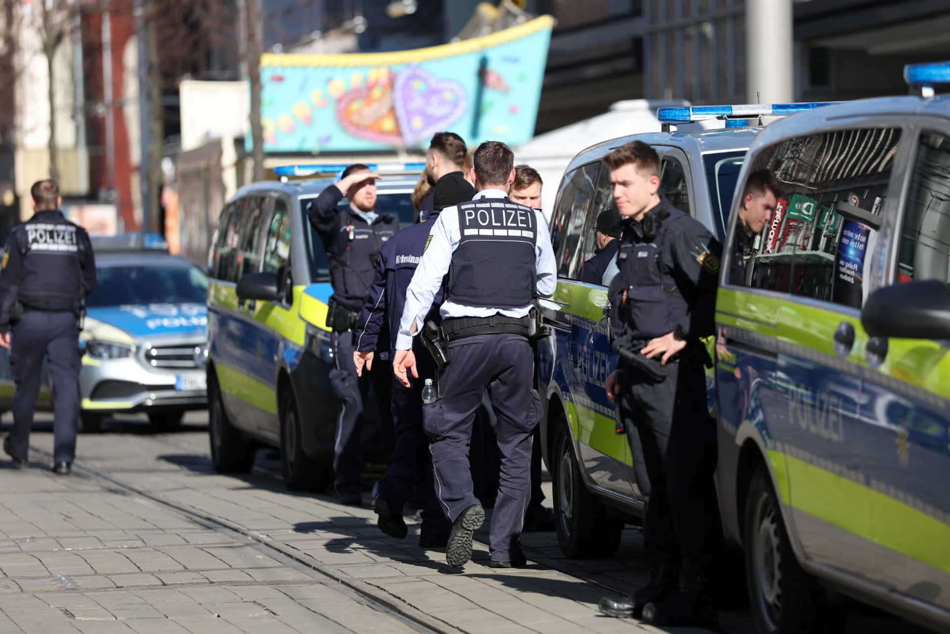 Police talk near the scene after a car drove into a crowd, in Mannheim, Germany, March 3, 2025. Photo: Reuters