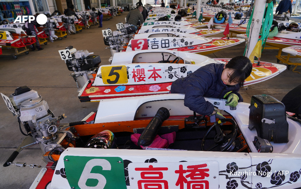 This photo taken on February 23, 2025 shows powerboat racer Suzuka Takahashi preparing to launch before her race at Tokyo's Tamagawa boat course for the first day of a recent powerboating competition. Photo: AFP