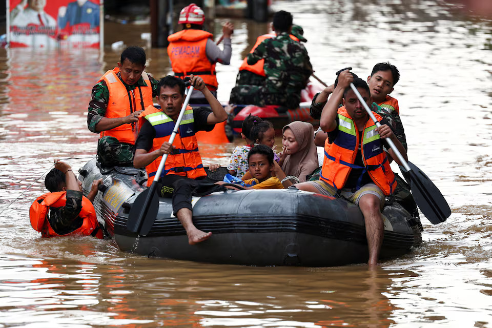 Floods in Indonesia's capital displace thousands