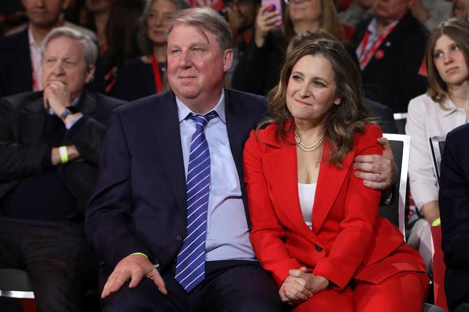 Former Deputy Prime Minister and Finance Minister Chrystia Freeland and her husband Graham Bowley look on after it was announced that former Bank of Canada and Bank of England governor Mark Carney won the race to become leader of Canada's ruling Liberal Party and will succeed Justin Trudeau as Prime Minister, in Ottawa, Ontario, Canada, March 9, 2025. Photo: Reuters