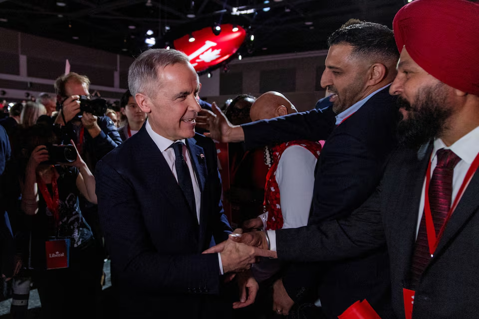 Former Bank of Canada and Bank of England governor Mark Carney greets supporters after he won the race to become leader of Canada's ruling Liberal Party and will succeed Justin Trudeau as prime minister, in Ottawa, Ontario, Canada March 9, 2025. Photo: Reuters