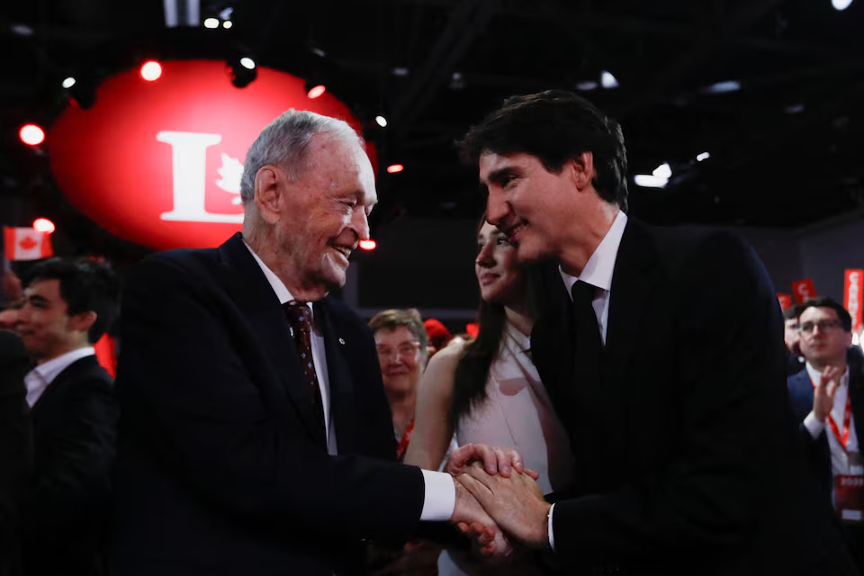 former Prime Minister Jean Chretien and Justin Trudeau interact after former Bank of Canada and Bank of England governor Mark Carney won the race to become leader of Canada's ruling Liberal Party and will succeed Justin Trudeau as Prime Minister, in Ottawa, Ontario, Canada, March 9, 2025. Photo: Reuters