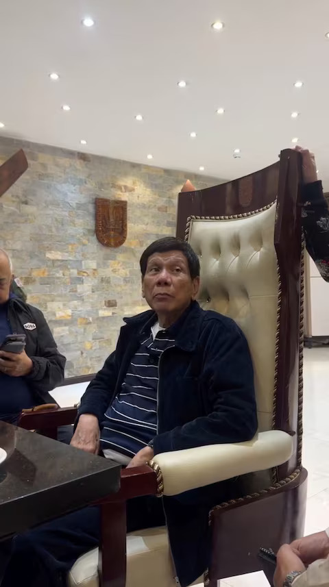 [2/14]Philippine former president Rodrigo Duterte sits in a chair, in a location given as Villamor Air Base, after being served an arrest warrant by the International Criminal Court, in Metro Manila, Philippines, in this screengrab obtained by Reuters from social media video on March 11, 2025. Photo: Reuters