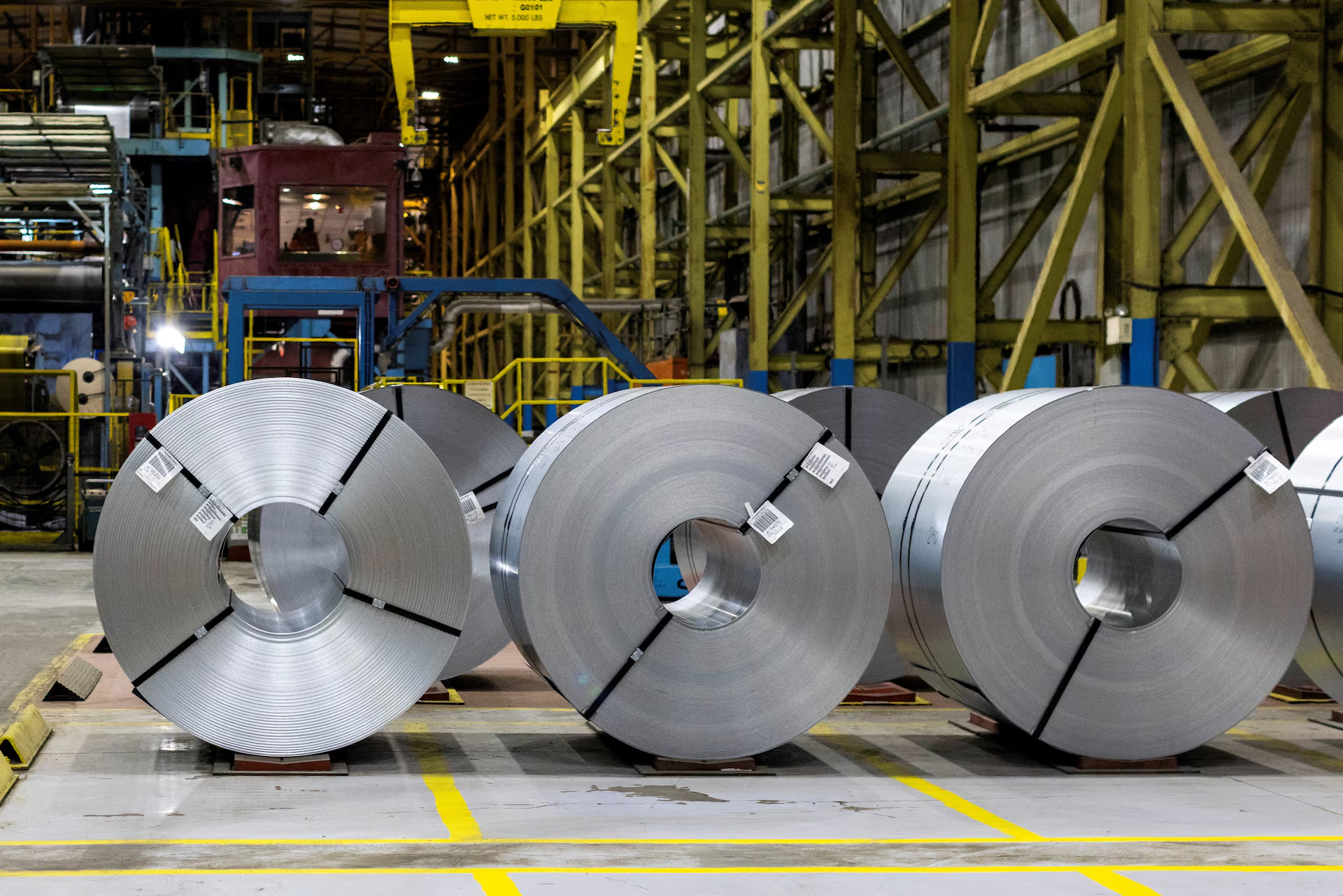 Raw steel coils are seen on the floor of the galvanizing line at ArcelorMittal Dofasco in Hamilton, Ontario, Canada February 14, 2025. Photo: Reuters