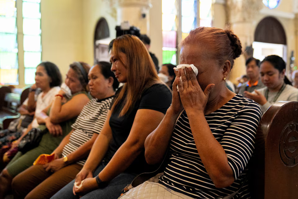 [6/14]Relatives of victims of drug war and extrajudicial killings attend a mass following the arrest of former Philippine President Rodrigo Duterte, in Quezon City, Philippines, March 11, 2025. Photo: Reuters