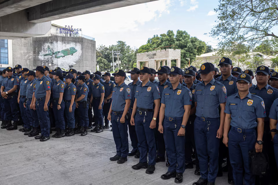 [11/14]Members of the Philippine National Police standby outside the Villamor Airbase where former Philippine president Rodrigo Duterte is currently held after being arrested, in Pasay City, Metro Manila, Philippines, March 11, 2025. Photo: Reuters