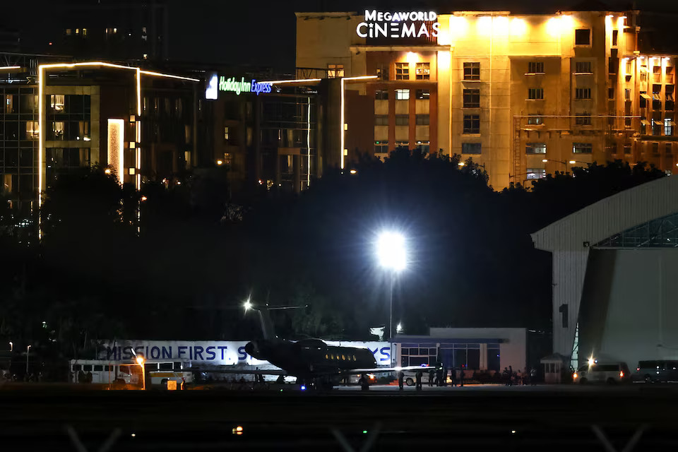 [12/14]A chartered plane with former Philippine President Rodrigo Duterte on board stands outside the Villamor Airbase, hours after Duterte was arrested, as seen from a viewdeck in Pasay City, Metro Manila, Philippines, March 11, 2025. Photo: Reuters