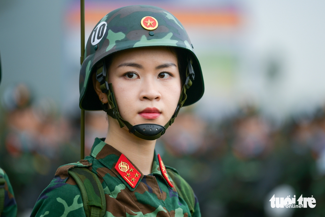 A female signal soldier is seen during the military parade in Hanoi on March 13, 2025. Photo: Nam Tran / Tuoi Tre